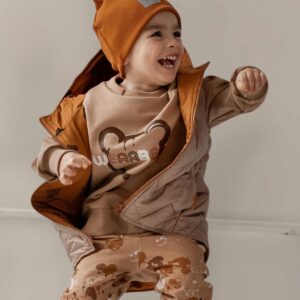 beżowa kamizelka dziecięca